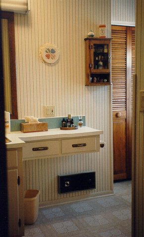 Relocated vanity and linen closet