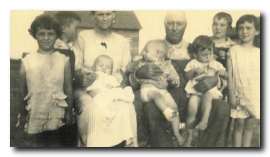 Elizabeth and James Bevins and their grand children