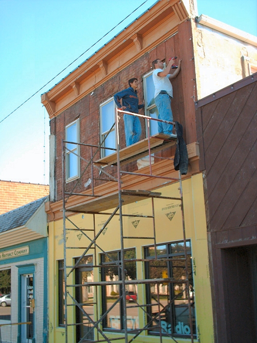Installation of sheathing & removal of siding