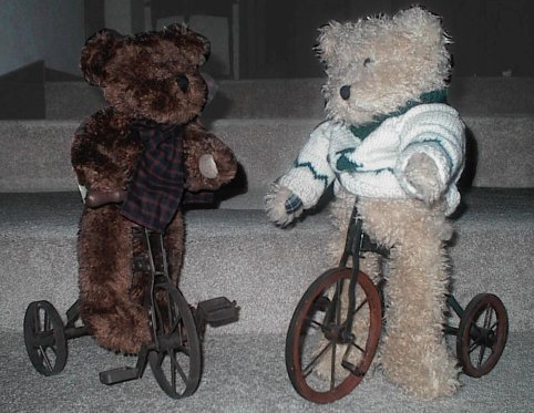 A few of my bears help me display my small collection of toy type items, such as these trikes