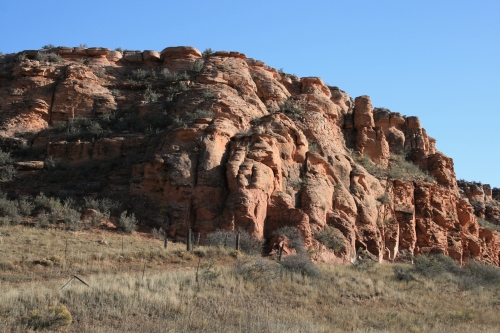 Red rock cliffs along Highway 287